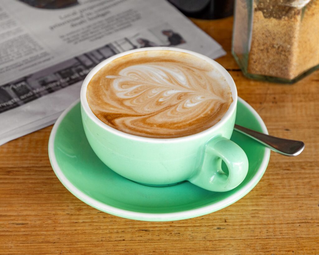 Latte with latte art at Hot Poppy Cafe